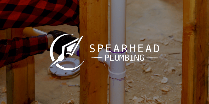 a contractor installing a plumbing vent pipe